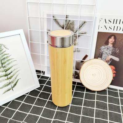 China Temperature Display 500ML Bamboo Cover With Stainless Steel Matching And Double Wall Insulated Water Bottle With Strainer for sale