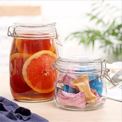 China Good Stocked Honey Candy Big Clear Glass Storage Jar With Hinged Clamp Li for sale