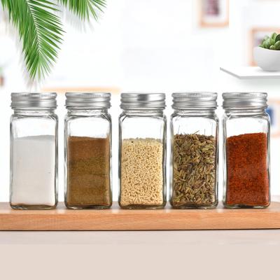 China Empty Jar Sustainable Square Kitchen Glass Spice Jars For Small Pour Shakers With Sieve Pour Shakers Bottles Labels Metal Wholesale Storage for sale