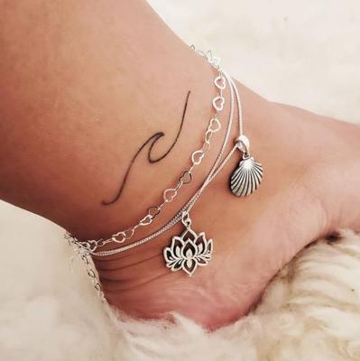 China 2022 FASHIONABLE multi-layer foot chain foot decoration anklet chain anklets gypsy lotus shell alloy bohemian retro anklet jewelry for sale