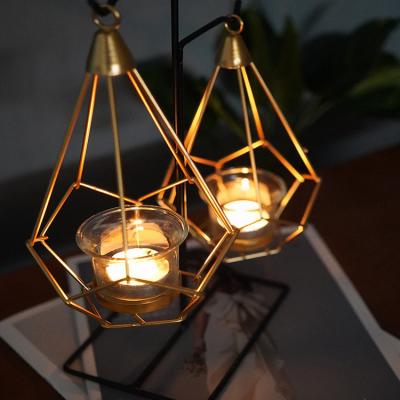 China Modern Nordic Luxury Geometric Wrought Iron Candle Holder Light Wedding Candlelight Romantic Dinner Props European Ornaments for sale