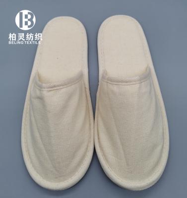 China Disposable Hotel Guest Room Slippers Non Woven Hotel Slipper Customized Eco - Friendly Slipper for sale