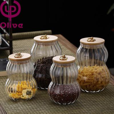 China Freshness Preservation Vertical Sealing Glass Jars Storage Jars Food Grade Grains And Bottle Sealed Cereals Storage Bottles for sale