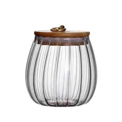 China High Freshness Preservation Round Shape Borosilicate Ring Vertical Stripe Storage Clear Trapezoidal Glass Copper Jar With Bamboo Cover for sale