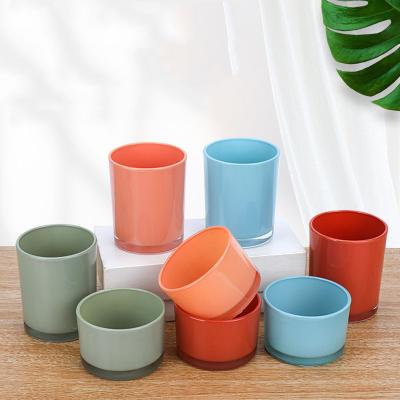 China Home Decoration Color Aromatherapy Candle Holder Stain Supply Candle Frosted Glass Container Small Glass Cup Ornaments for sale