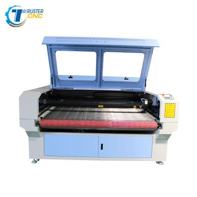 China Laser Cutter Automatic Feeding Textile Laser Cutting Machine For Making Clothes Shoes Sofa for sale