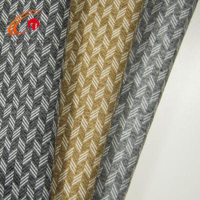 China Stretch Chunnuo Textile Classic Herringbone Jacquard Parttern TR Knitted Fabric For Suit for sale