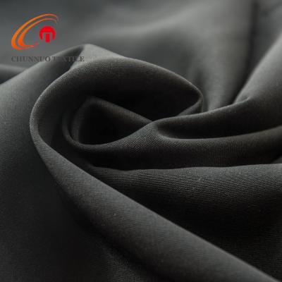 China Chunnuo Tear-resistant Textile 100D*100D Fdy Plain Weave 100% Polyester With Raincoat For Pants for sale