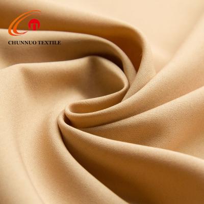 China Fdy High Stretch Polyester Fabric 120D*120D Woven Fabric 100% Tear-resistant Plain Dyed Fabric For Pants for sale