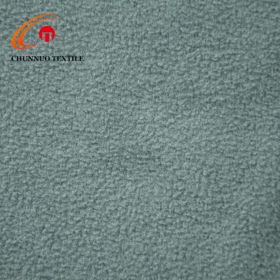 China Memory Stretch Manufacturer Chunnuo 100%Poly DTY Double Brushed Fleece Fabric For Jacket for sale