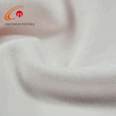 China Memory Chunnuo Textile DTY Brushed Plain Dyed Fabric Cobmined Fleece Fabric for sale