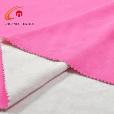 China Stretch Chunnuo Textile DTY Brushed Solid Fabric Metallic With Soft Velvet Fabric For Dress for sale