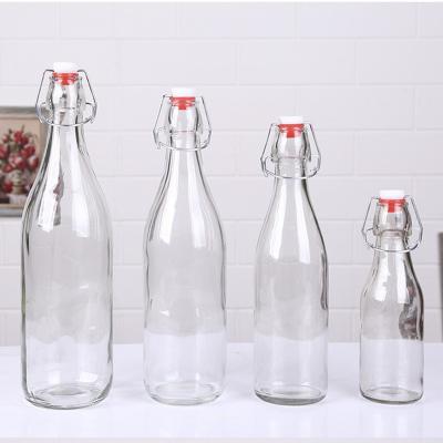 China Drinking Container ES68 Juice Swing Top Glass Bottles Beverage China Wholesale Beverage Packaging for sale