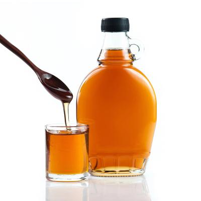 China Beverage Factory Wholesale OEM Beverage ES115 Maple Syrup Bottle Champagne Alcohol Whiskey Drinking Liquid With Handle for sale