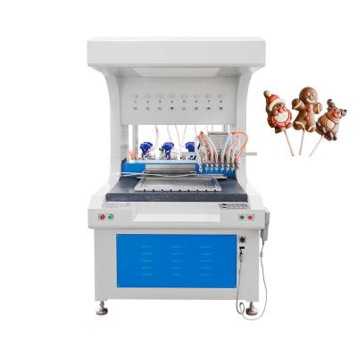 China Blue White Chocolate Decorating Machine Automatic Chocolate Ball Making Machine for sale