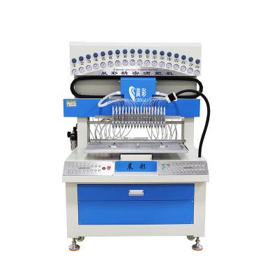 China 18 Colors silicone dispensing machine 3D Clothing Logo Patch PVC Rubber Patch Making for sale