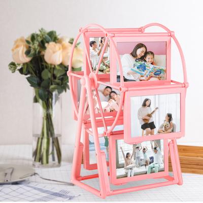 China Northern Europe Creative White Retro Rotating Ferris Rotating Windmill Wheel Photo Frame For Wedding for sale