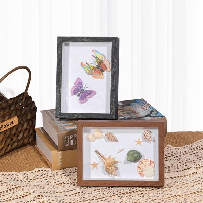 China Nordic creative simple dark oak wooden photo frames for home decoration for sale