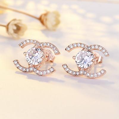 China VEROMCA CLASSIC Micro Pave Zircon Silver Needle Earrings Japanese And Korean Letter Earrings for sale