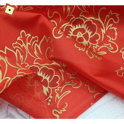 China Breathable our factory directly sells peony pattern mattress fabric warp knitted polyester gold powder printed bedspread fabric for sale