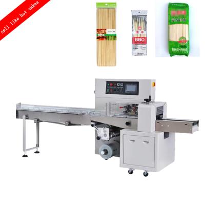 China Yongxiong Austomatic Popular Food Horizontal Flow Pillow Fruit Packaging Machine for sale