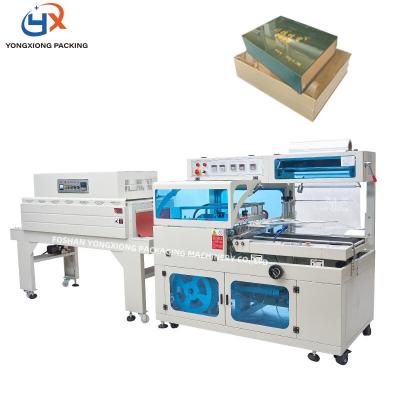 China Hot Packer L Bar Sealer Automatic Shrink Film Shrinking Machine Heat Shrink Food Heat Constringency Cutter for sale