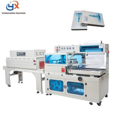 China Fully automatic low price L type food sealer and shrink tunnel shrink wrap machine for sale