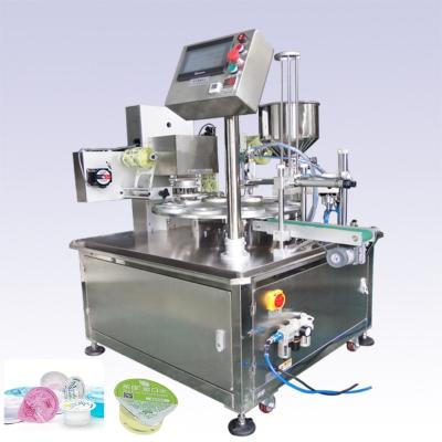 China Food factory price mini automatic jelly honey cone filling machine ice cream rotary ice cream filling machine for sale