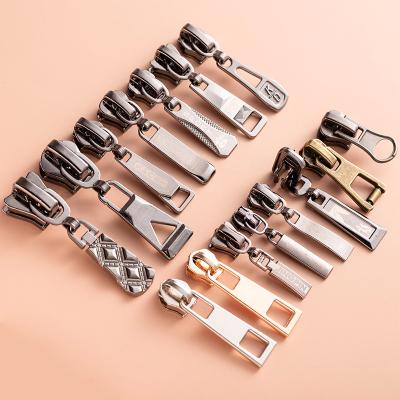 China Other High Quality Wholesale Zipper Sliders Metal Purse Bags and High Quality Custom Garment Zipper Pullers for sale