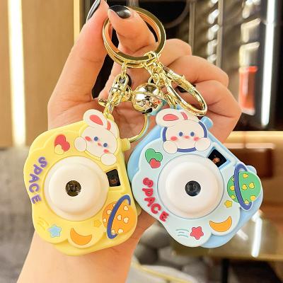 China Bag Car Pendant Accessories Wholesale Bunny Projection Camera Lighting Keychain Fashion Cute Decorative Animal Rubber PVC Doll Keychain For Bag Hanging for sale