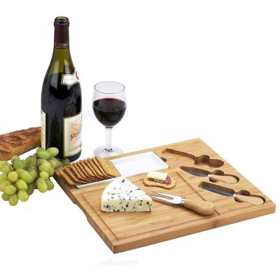 China Viable Engraved Bamboo Cutting Board for Cheese and Charcuterie with Ceramic Dish, Knife Set for sale