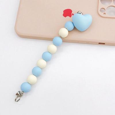 China Fashion Heart Simple Discount Girl's Phone Case Charm Creative Chain Bead Phone Shape for sale