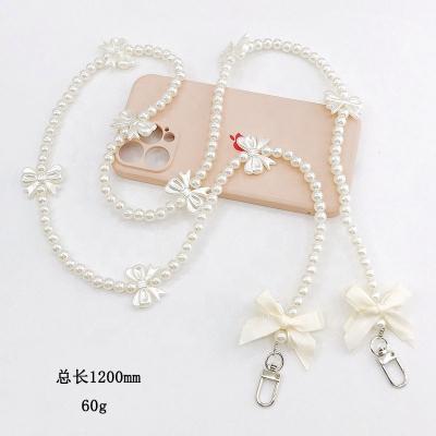 China Other Pearl Necklaces Elegant Abstract Classic Modern Pearl Bowknot Pearl Key Chain for sale