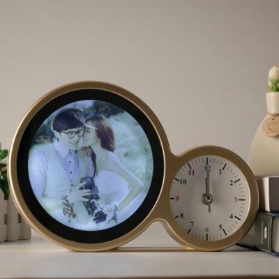 China Hot Creative Multi Functional Magic Mirror LED Beautiful Photo Frame With Clock Can Be Used As A Mirror for sale