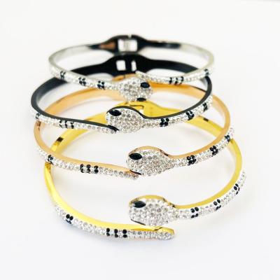 China TRENDY Full Diamond Snake-Shaped Open Bracelet Elegant Female Snake Bone Head Stainless Steel Chain Snake Bracelet for sale