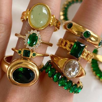 China TRENDY Waterproof Wedding Luxury Women Oval Bling Emerald Inlaid Gemstone Cz 18K Gold Plated Green Zircon Stainless Steel Jewelry Ring for sale