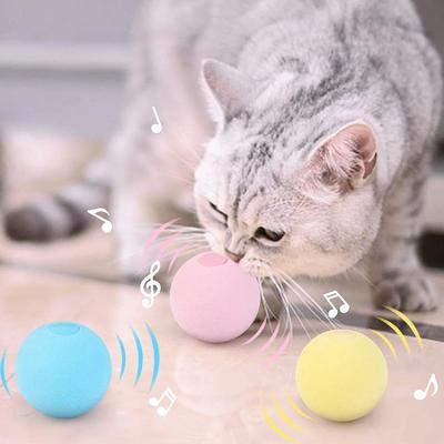 China Sustainable Automatic Led Eva Happy Pet Cute Smart Interactive Self Rotating Cat Playing Rolling Toys Balls for sale