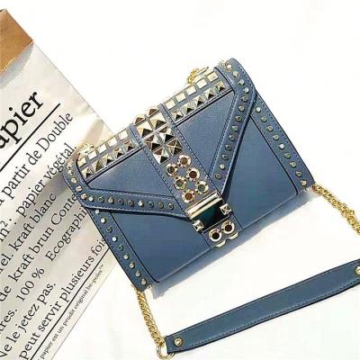 China SH1474 High Quality Leather PU Fabric Trader Whitney Handbag Shoulder Lady Bags 2020 Rivets Little Girls Cross - Body Bag for sale