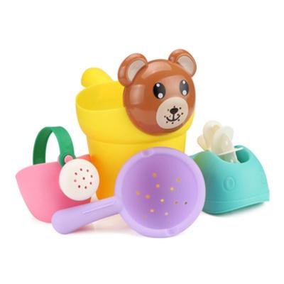 China Beach Tool Toys Kids Bathing Beach Soft Rubber Toys 4 Piece Water Splash Wheel Boy Girl Duck Shampoo Cup Baby Sprinkler Set Yellow Bottle for sale