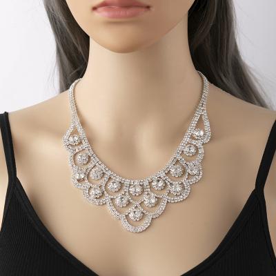 China 2022 TRENDY New Product Ideas Custom American Diamond Wedding Rhinestone Necklaces And Snake Earring Set Bridal Jewelry For Women for sale