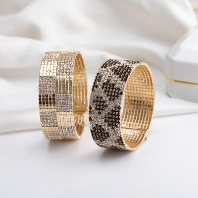 China Cheap Bangle Accessories Brazilian Round Gold Jewelry Diamond Bangle Wide Cuff Cuban Magnet Copper Bracelet With Rhinestones Women for sale