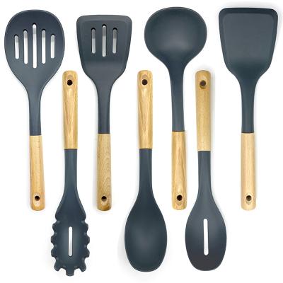 China 7 Pieces High Quality Durable Silicone Nonstick Cooking Tool Kit Kitchen Utensils Heat Resistant With Wooden Handle for sale