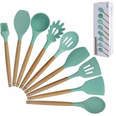 China Sustainable Amazon Kitchenware 9PCS Silicone Cooking Tools With Natural Wood Handle for sale