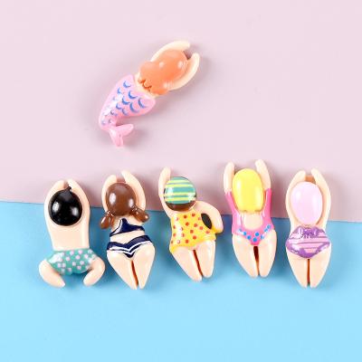 China 100Pcs/Bag Europe Cartoon Mermaid Boy Girl Resin Swimming Cabochon For Hair Bow Center Phone Case Decoration Accessories for sale