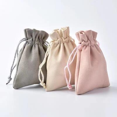 China Shenzhen Yongjiaxin Logo Luxury Soft Custom Pouches Jewelry Packaging Pouch Microfiber Drawstring Gift Bag for sale