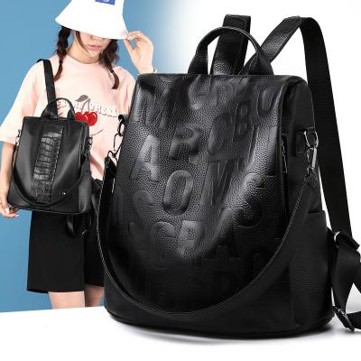 China Portable High Quality Anti Theft Black Women Backpack YIMYIK Universal Letters Embossed Lady Shoulder Backpack for sale