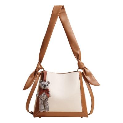 China Other YIMYIK Korean Fashionable Girls Style Tote Bags Famous Design Stitching Color Genuine Leather Shoulder Bags Large Capacity for sale