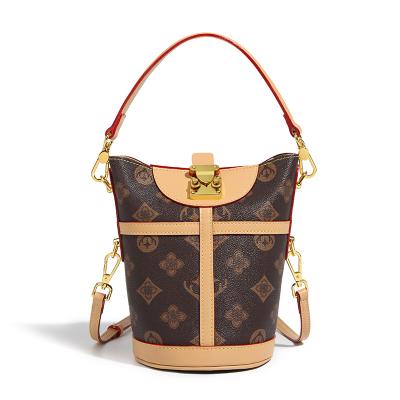 China Fashion designers high quality women bags shoulder cylinder luxury classic printing leather bags for ladies for sale