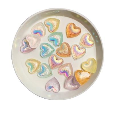 China Fashionable New Flatback Resin Carving Aurora Flatback 10MM Heart Shape Suitable For Nail Decoration 100PCS for sale