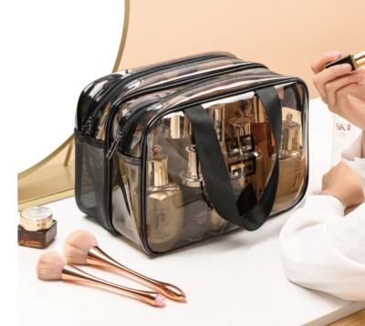 China Korean Handled Clear Transparent Cosmetic Bag With Zipper PVC Transparent Waterproof Pouch Cosmetic Bag for sale